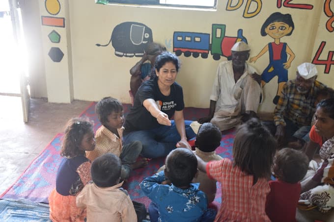 Children receiving educational materials