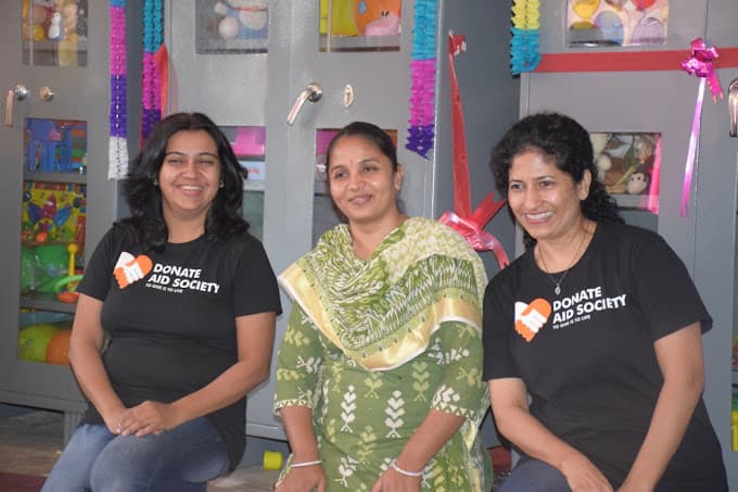 Volunteers working with children